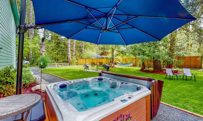 Mason County Casa | Inviting riverfront home with hot tub, firepit, W/D, & dog-friendly