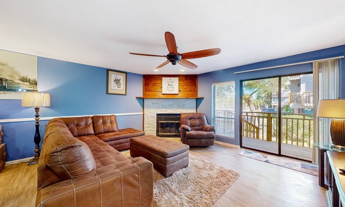 East End Casa | Inviting townhouse with on-site pool, updated interior, & W/D
