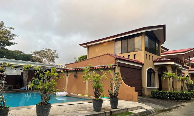 Cerro Plano Casa | Jaco Hideaway: 1 minute walk to direct beach access. Gated community with pool.