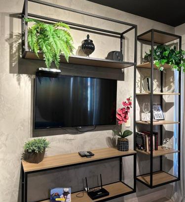 Smin Apartamento | Jardim no concreto Lake side