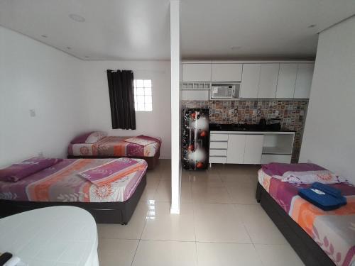 Simoes Lopes Apartamento | JK Studios e Kitnets GARAGEM central SEM TAXAS