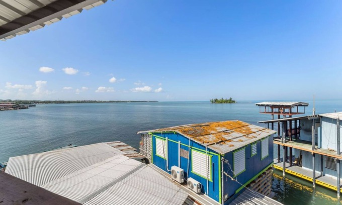 Guanajibo Casa | Joyuda beach house with stunning views of Isla ratones!