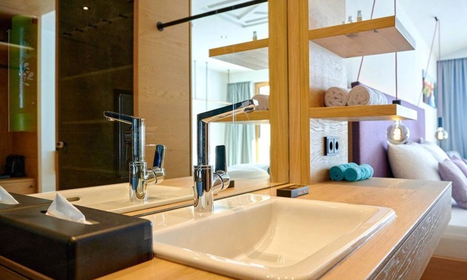 Maria Alm am Steinernen Meer Casa | Junior Suite Deluxe Morning Time Longstay - Hotel Morning Time Naturally. Cama y brunch