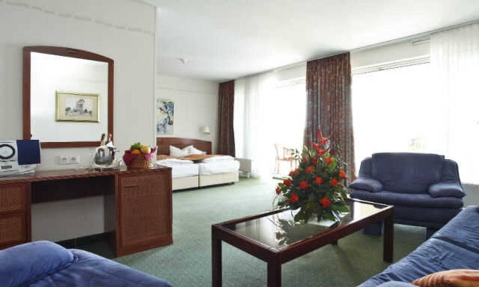 Muritz Otro | Juniorsuite Müritzblick Orangerie Seeseite - Seehotel Schloss Klink