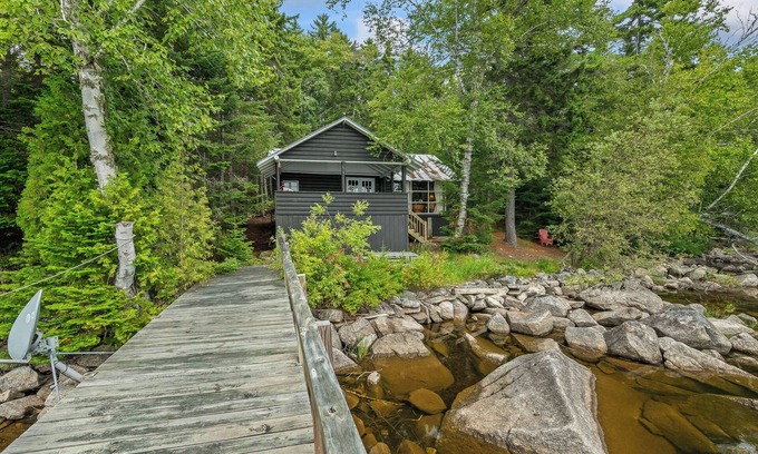 Rangeley Casa | Kadel: esta casa de troncos de Maine en el lago Mooselookmeguntic está llena de encanto rústico