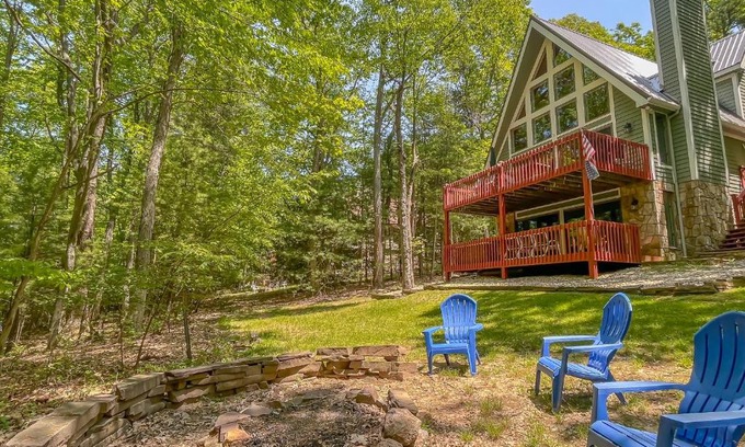 Swanton Villa | Kayaks Included Lakefront Home w Fire Pit Hot Tub Dock