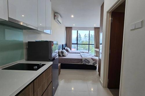Batu Lintang Apartamento | Kenyalang Kozi Square Homestay