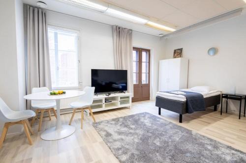 Varkaus Apartamento | Keskusta sviitti parvekkeella ja pyykinpesukoneella Vanha Postitalo
