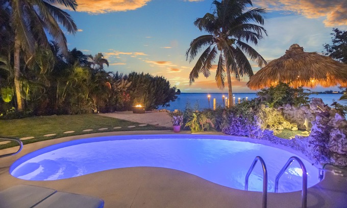 Bay Point Casa | Key West Beach House with heated pool, tiki, and dock.♿︎