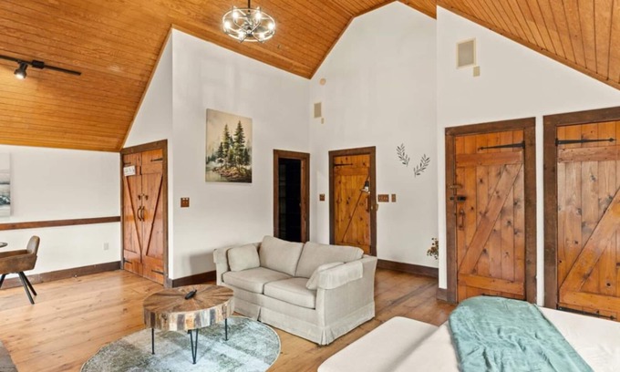 Townsend Hotel | King Suite w/ Skylights | Sofa Lounge | Balcony + Trees