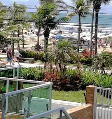 Boqueirao Apartamento | kitnet pé na areia, em frente a praia.