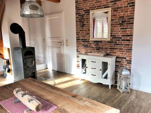 Landkirchen Casa | kleine meerZeit, süßes Knusperhäuschen mit Kaminofen