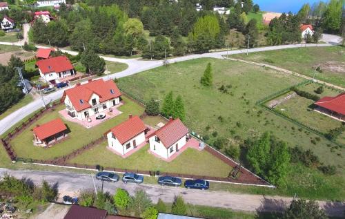 Kruklanki Apartamento | Komfortowe domki letniskowe nad jeziorem na Mazurach 2
