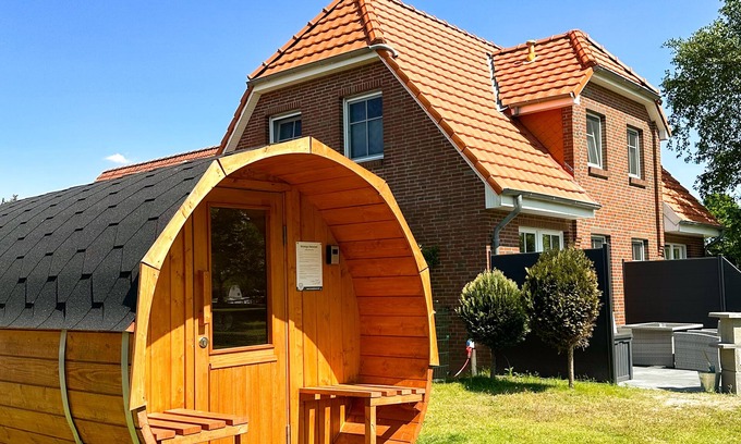 Tannenhausen Casa | Lüttje Huck - Ferienwohnung 3 mit Seeblick & Sauna