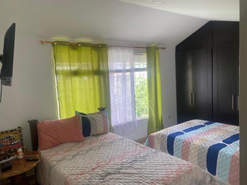 Calarca Casa | La Posada de Laura - Habitación