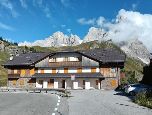 Passo Rolle Apartamento | LA PULCE INNEVATA - Agenzia Dolomiti Affitti
