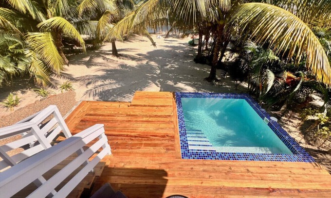 Caribbean Way Casa | La Vida Casita - Cozy beachfront bungalow steps from the beach.