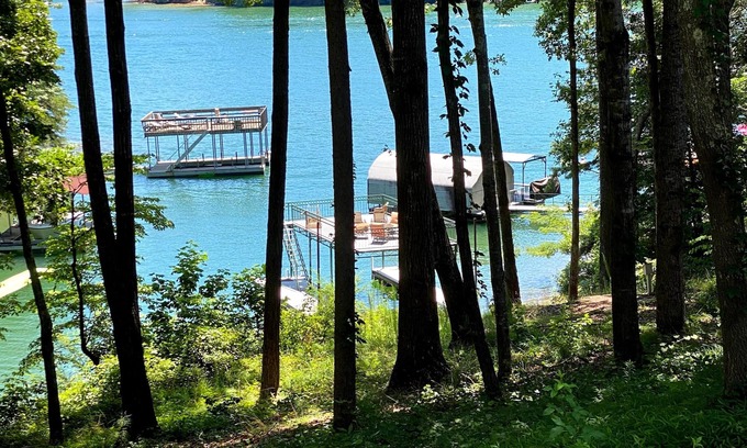 Flowery Branch Casa | Lake Front, Dock, Tennis Courts, Pool, Hot Tub, Gated, Oasis