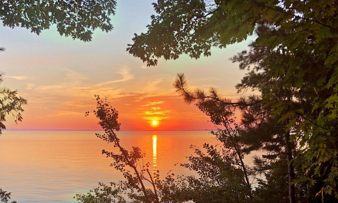 Ellsworth Casa | Lake Michigan Sunsets and sandy beachfront home on Grand Traverse Bay