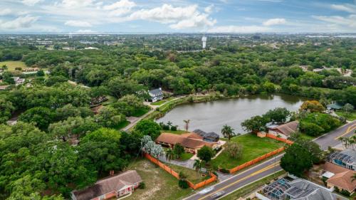 Bradenton Casa | Lake O' Woods! Gated private pool home!