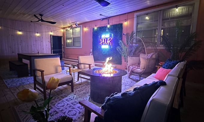 Barnett Casa | Lake of the Ozarks Lakefront home with water slide and game porch