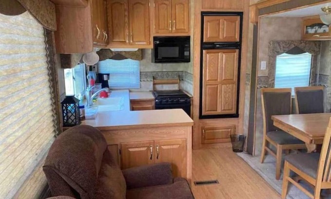 Swanlake Casa | Hammocks & kayaks with1 bed trailer, tiki torches, & tent space for extra guest