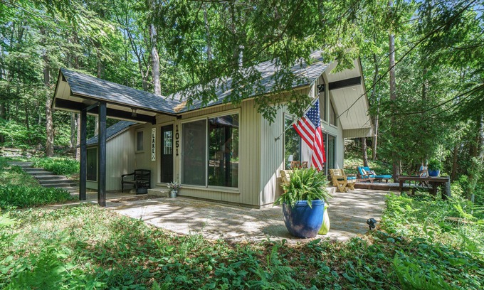 Lake Township Casa | Dog-friendly cabin with lake views, a patio, and a wood-burning stove