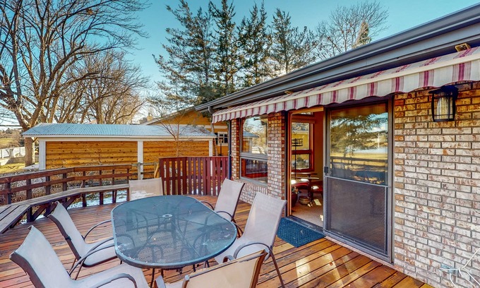 Greeley Casa | Lake-view home with gas fireplaces, inviting deck & dog-friendly yard