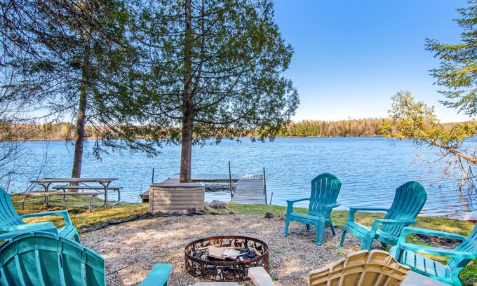 Presque Isle Cabina | Lakefront Getaway W/ Firepit, Free WiFi, Dock, & Large Deck - Dogs Welcome