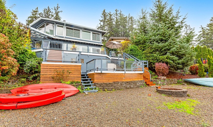 Olympia Casa | Lakefront home with canoe, kayaks, large deck, beach access, fireplace, & W/D