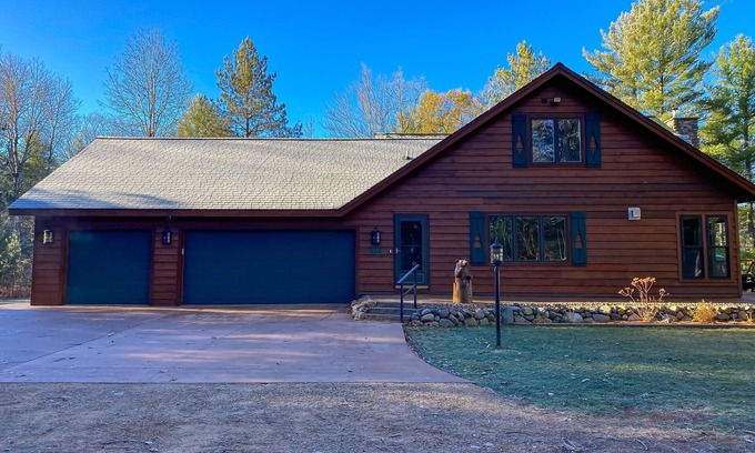 Conover Casa | Lakefront home with game rooms, dock, kayaks, private beach, fireplace, firepit