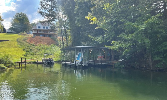 Winchester Casa | Lakefront home with dock. Cozy 2 bed 2 bath and screened in porch.