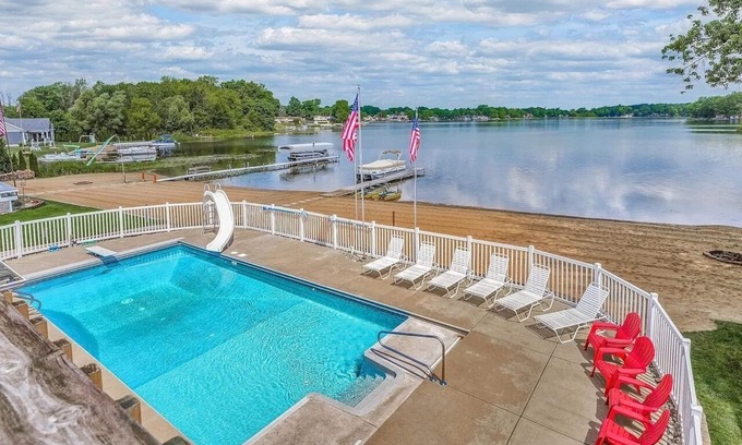 Kent County Casa | Lakefront W/ Private Beach, Pool, Hot Tub, Golf Simulator, Projector, Bar & more
