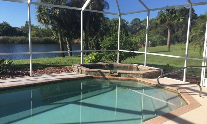 Long Meadow Villa | Villa Rotonda West junto al lago en un campo de golf con piscina y terraza orientadas al sur