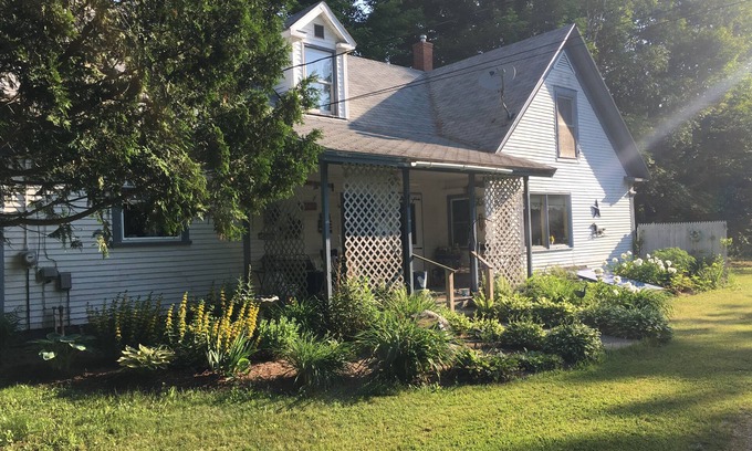 Brighton Otro | Lakeview Farmhouse with private beach access and on snowmobile VAST trail.