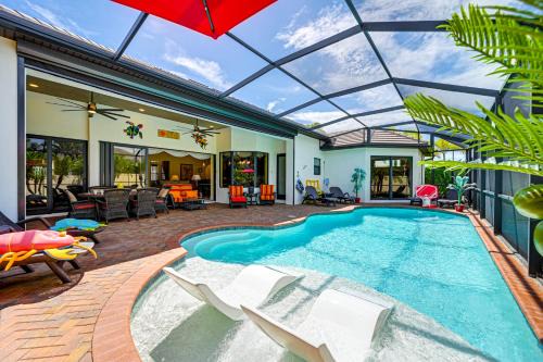 Pelican Casa | Lanai with Heated Pool at Cape Coral Escape!