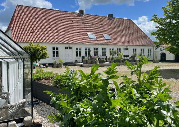 Genner Apartamento | Landligt ophold på Midtgård
