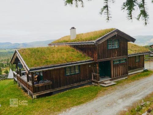 Nes Casa | Large cabin at Nesfjellet with lovely view, inddor Jacuzzi & sauna