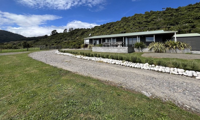 Mokihinui Casa | Large home with stunning sunset views.