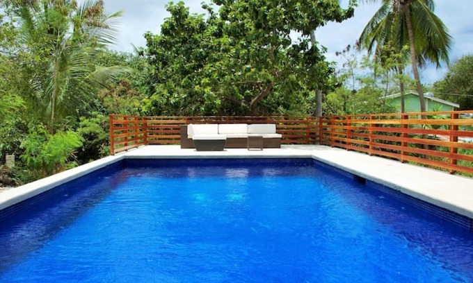 Derricks Villa | Large modern villa with pool on West Coast near beach & restaurants w/ parking.