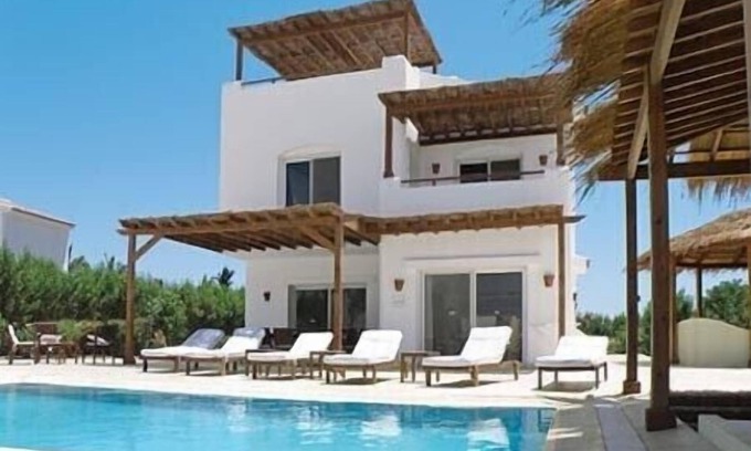 El Gouna Villa | Gran villa con piscina climatizada directamente en la playa de la laguna con embarcadero privado