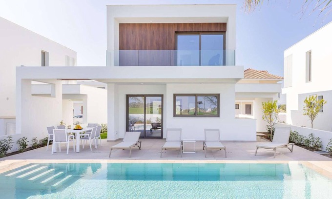 Softades Casa | Larnaca Blue 16 is a contemporary villa on a gated complex.