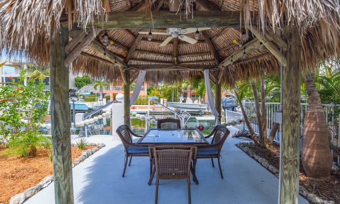Summerland Key Casa | Latitude Adjustment – Canalfront 3BR w/ Hot Tub, Tiki Hut & Boating Access