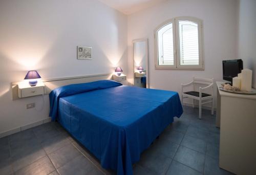 Torre Suda Apartamento | Le Bianche ville con patio privato a un passo dal mare