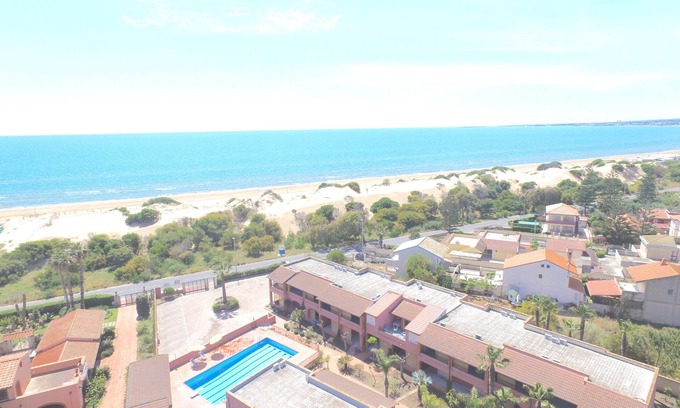 Santa Maria del Focallo Casa | Apartamento Le Dune Residence a 10 metros de la playa con bandera azul