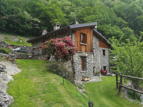 Capo di Ponte Casa | Le Rive nel bosco