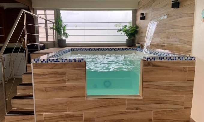 Bani Apartamento | Liana’s rooftop entire apartment with private jacuzzi just 8 min near the beach.
