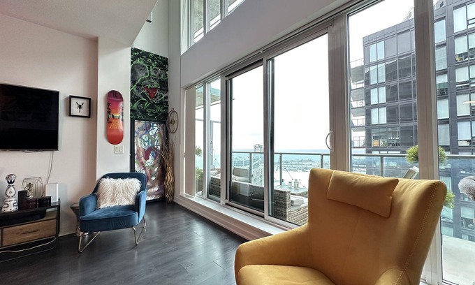 King West Village Condominio | Liberty Village charm, vibrant community, and a spacious loft await your stay!