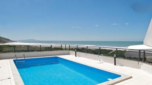 Ingleses Norte Apartamento | Linda cobertura frente mar com piscina privativa e pé na areia!