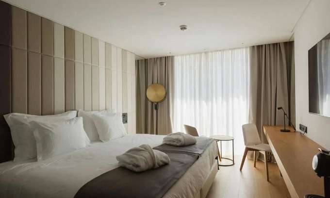 Sao Jorge de Arroios Hotel | Lisbon’s Light Show Awaits: Relax Poolside After City Wanders